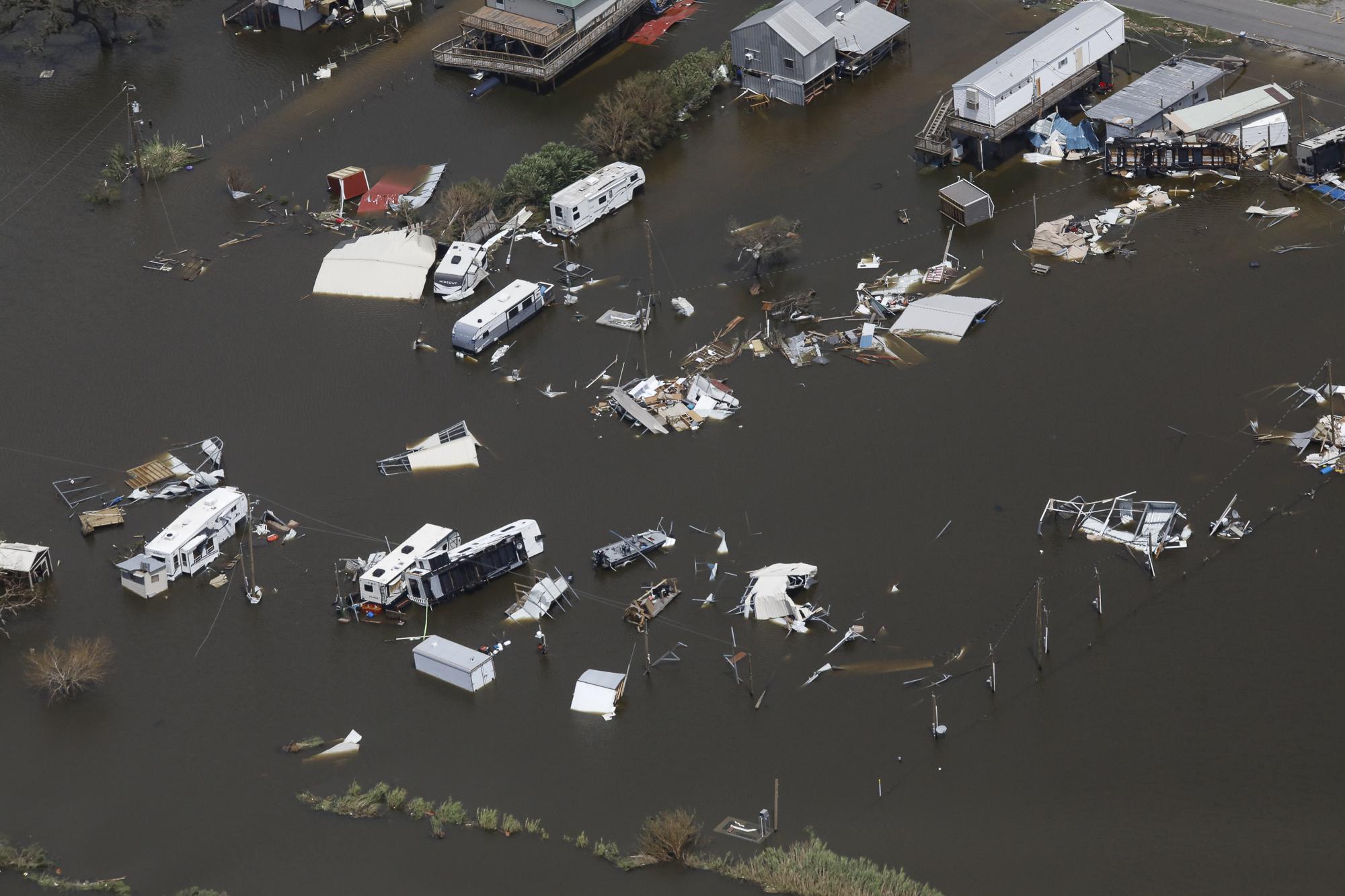 Hurricane Ida in Louisiana - An aerial view shows destroyed houses in a flooded area...