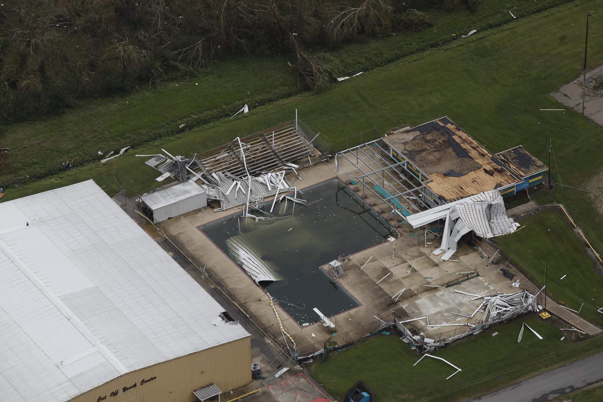 Hurricane Ida in Louisiana - An aerial view shows a damaged pool and a destroyed house...