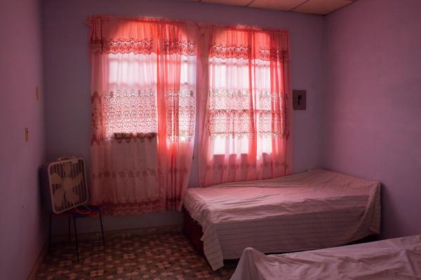 WELCOME TO INTIPUCA CITY - Inside Alfredo daughter&#39;s house, empty, in INtipuca. She lives in the US. Intipuca, 2019.
