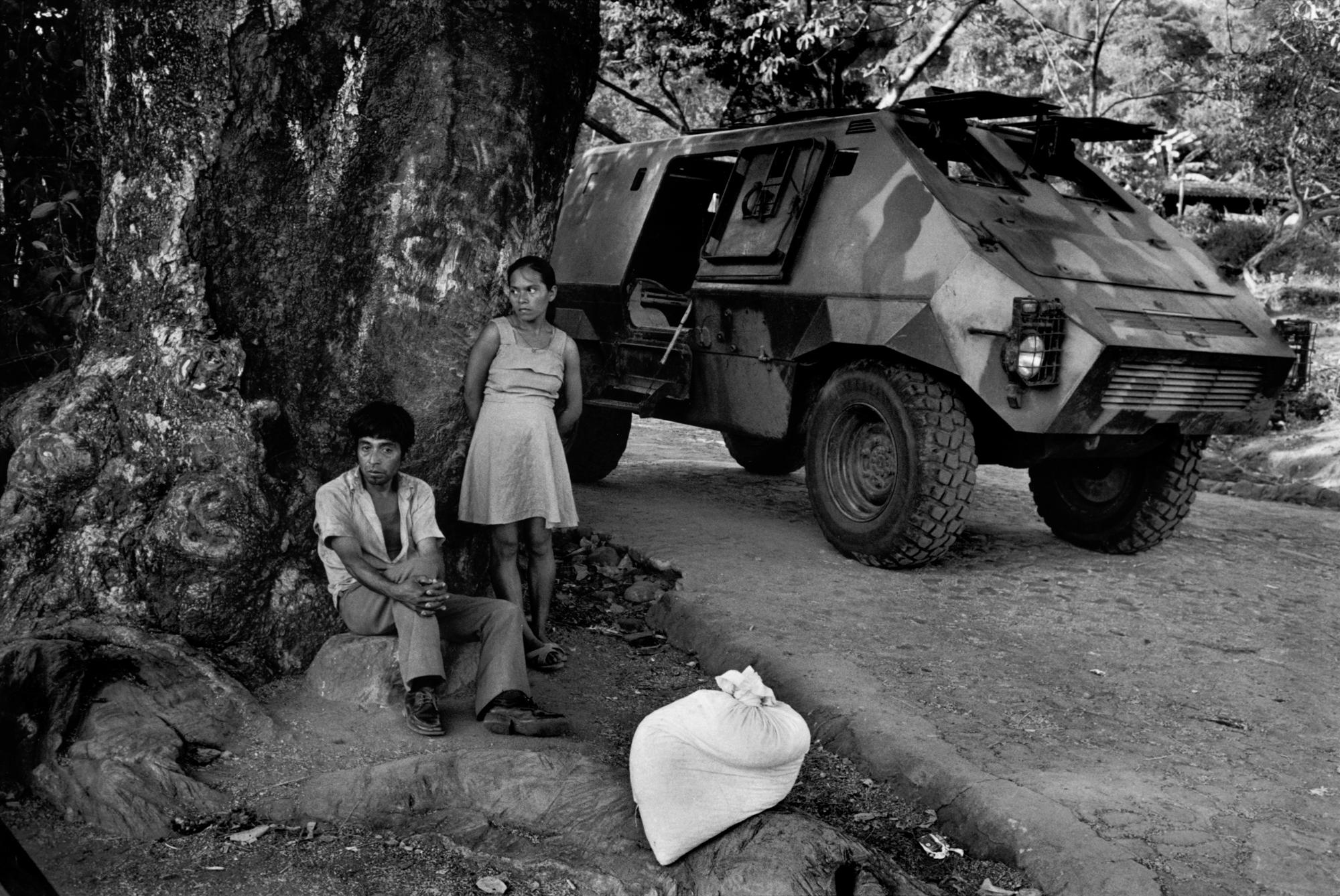 Waiting for the bus on the road to La Libertad. 1980