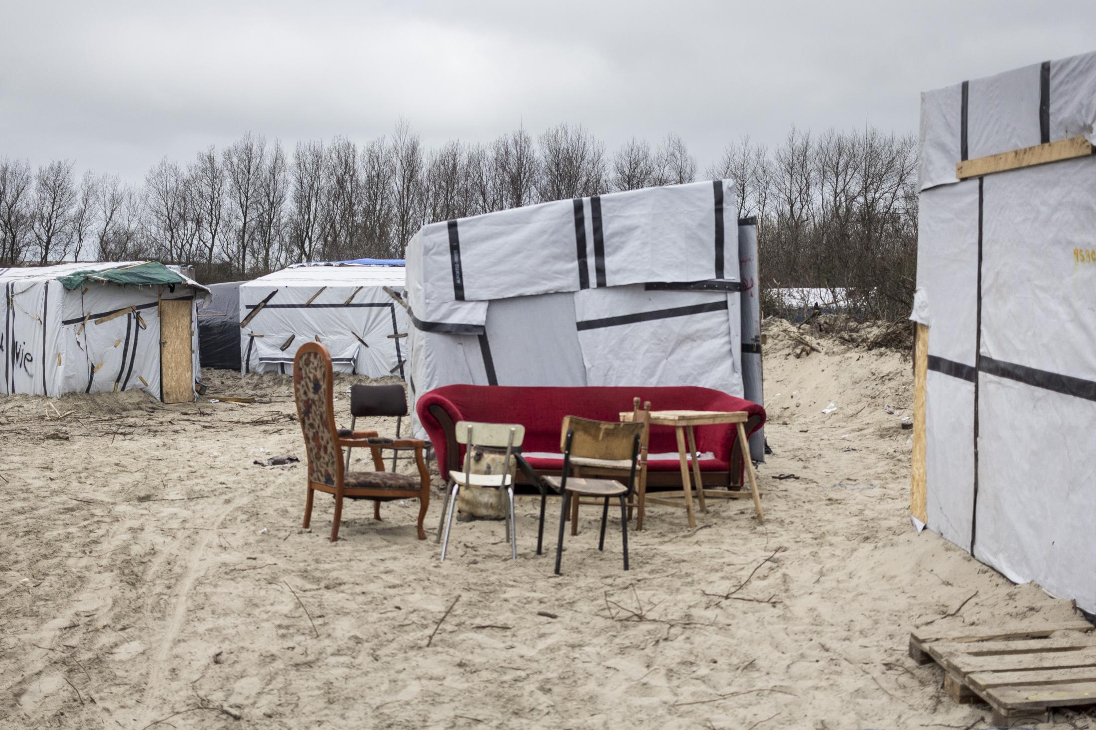 Latent urbanities - An outside living room in a soudanese community in New Jungle , the refugees camp in Calais. New...