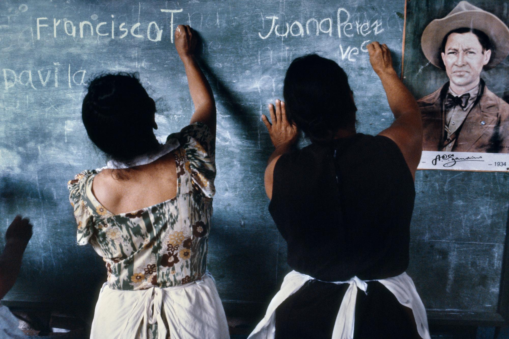 Nicaragua Reconstruction - Alphabetization campaign teaching literacy to women in...