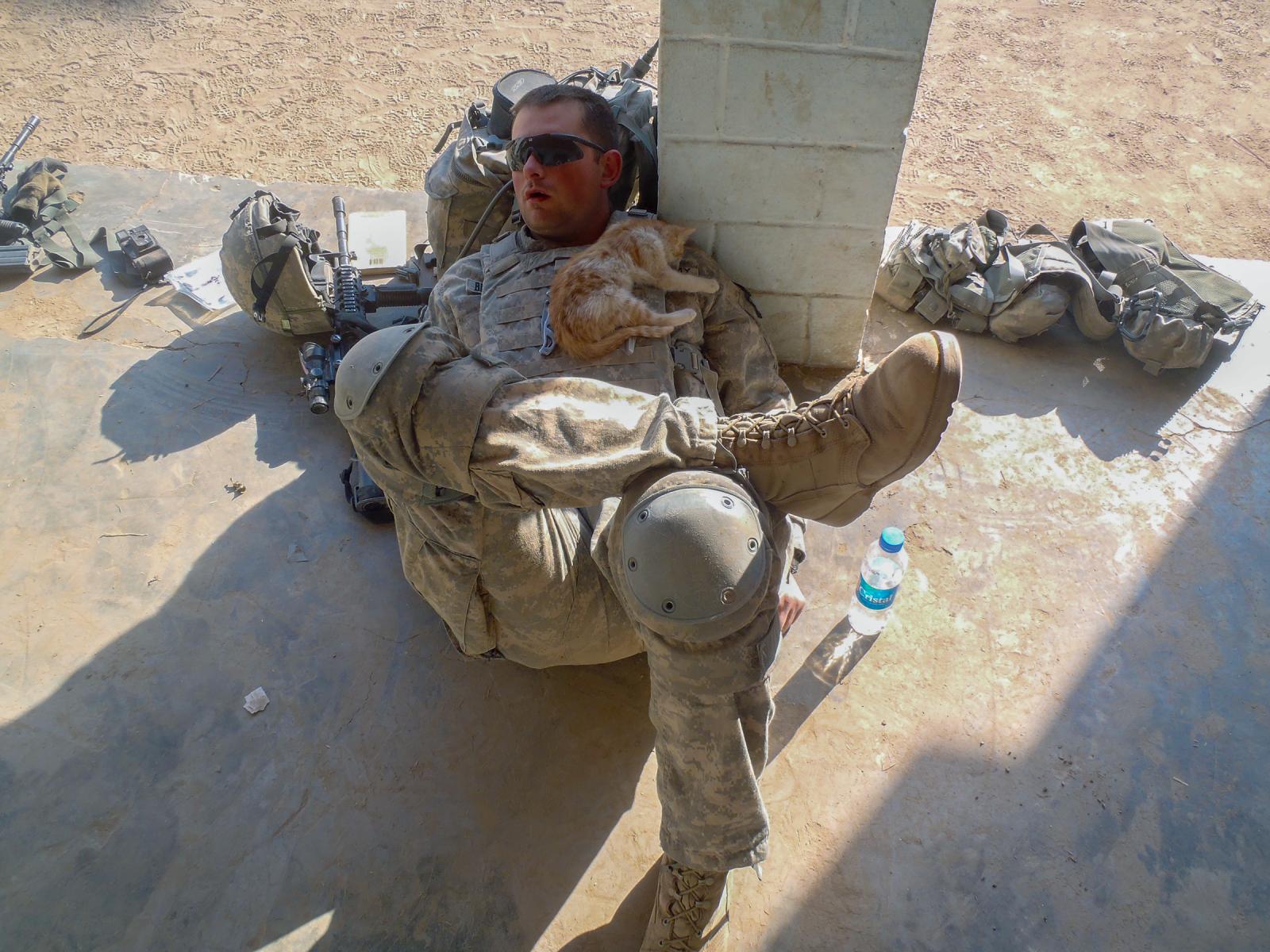 Soldiers rest when they can. He...houlder in Kunduz, Afghanistan.
