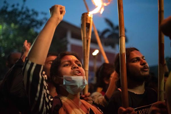 Reportage Images - Students attend a torch procession as they demanding...