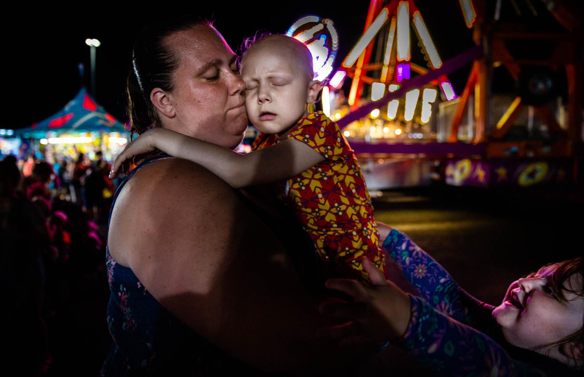 #kayleestrong - Kaylee and her mother, Kristina, embrace at the end of a...