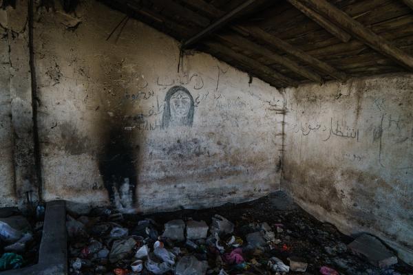 Stuck: The plight of Turkey's Afghan migrants - Grafiti and writings from the Undocumented Afghan migrants in an abondened animal barns on...