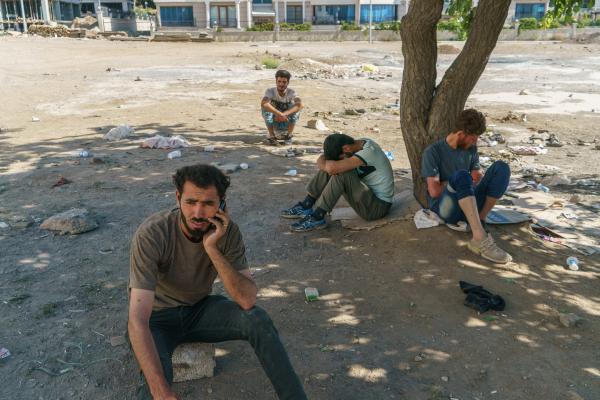 Stuck: The plight of Turkey's Afghan migrants - Undocumented Afghan migrants in an abondened bus station waiting to be transported to Istanbul,...