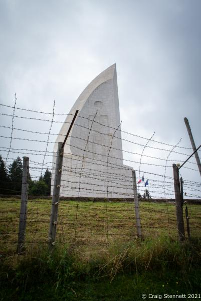 Natzweiler-Struthof Concentration Camp, Natzweiler, Bas-Rhin, France, 11th September 2021. The Monument to the Departed at Natzweiler-Struthof a Nazi concentration camp located in the Vosges Mountains in the Gau Baden-Alsace, on territory annexed by Germany in 1940. The camp operated from 21st May 1941 through to September 1944 and was the only concentration camp established by the Nazis on pre-war French soil. Roughly 52,000 prisoners were held there. They were mainly from the French Resistance. It operated as a labor camp, transit camp, and as the war went on, a place of execution (estimated 22,000 deaths). The inmates came from 32 different nations. An annual remembrance ceremony is held for all who were interned there and all who died. 2021, a special ceremony was held for Sergeant Frederick Habgood, who was a crew member of a Lancaster Bomber shot down over France on July 29, 1944. Sergeant Habgood was captured by the Gestapo, taken to the concentration camp and immediately hanged. His body was cremated at the site and his ashes flung into the &#39;Ash Pit&#39;. However, his silver bracelet, engraved with his name, miraculously survived. This bracelet was handed back to the surviving members of the Habgood family by Genevi&egrave;ve Darrieussecq, Secretary of State to the Minister of the Armed Forces for France.