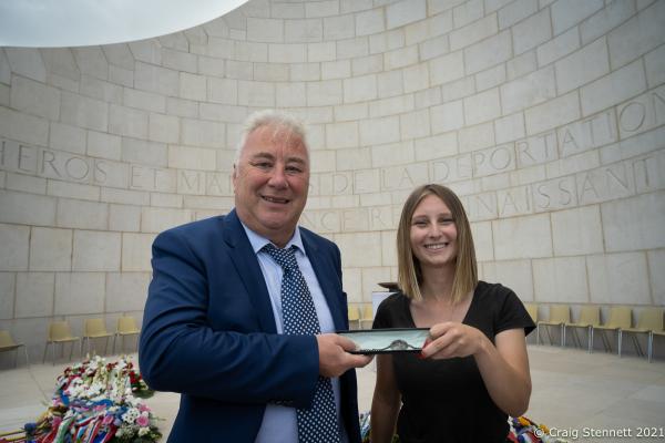 Natzweiler-Struhof Concentration Camp, Natzweiler, Bas-Rhin. France. 12th September 2021. Natzweiler-Struthof Concentration Camp, Natzweiler, Bas-Rhin, France, 12th September 2021. Paul Habgood with Anna Bennand who in 2018 found the silver bracelet belonging to RAF Sergeant Frederick Habgood in the &#39;Ash Pits&#39; of Natzweiler-Struthof Concentration Camp while she was tidying the area. 21 year old Sergeant &#39;Freddie&#39; Habgood was a crew member of a Lancaster Bomber shot down over France on July 29, 1944. He was captured by the Gestapo and taken to the concentration camp and immediately hanged. His body was cremated at the site and his ashes flung into the &#39;Ash Pit&#39;. However, his silver engraved bracelet miraculously survived. The bracelet was returned to Sergeant Habgood&lsquo;s surviving family members as a special part of the annual ceremony of remembrance at the camp each year. The bracelet was handed over to Paul Habgood by Genevi&egrave;ve Darrieussecq, Secretary of State to the Minister of the Armed Forces for France.