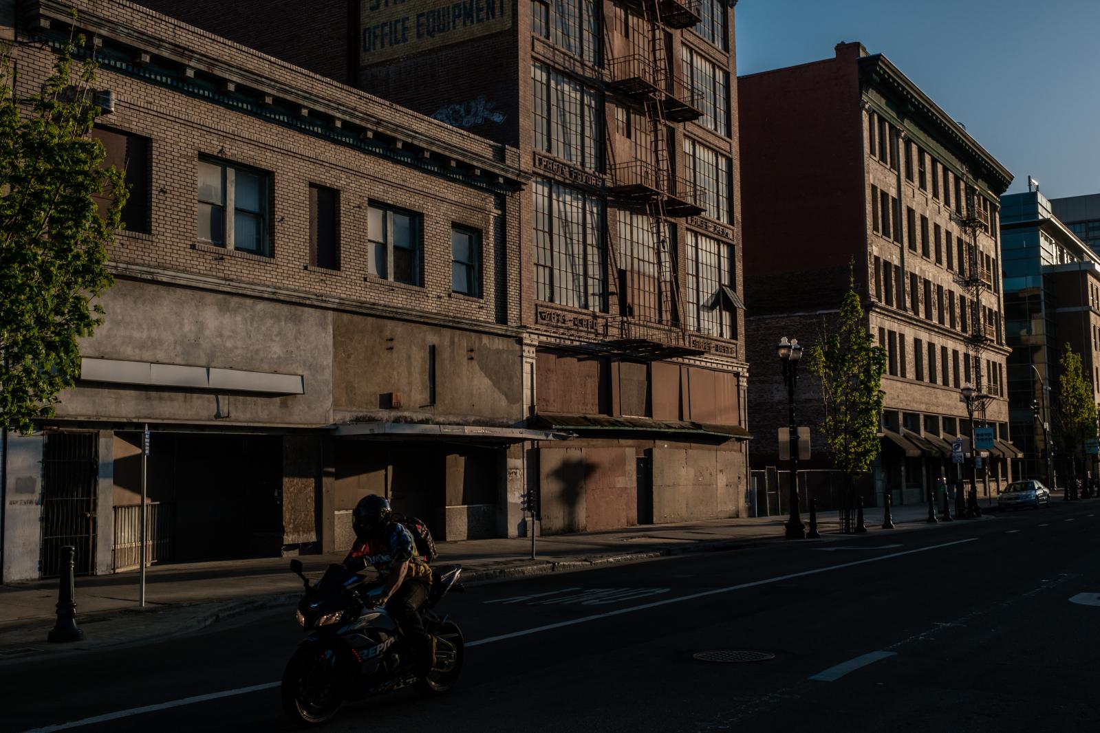 Image from Universal Basic Income: Trying to save a city - STOCKTON, CA - APRIL 5: A motorcyclist is seen riding...