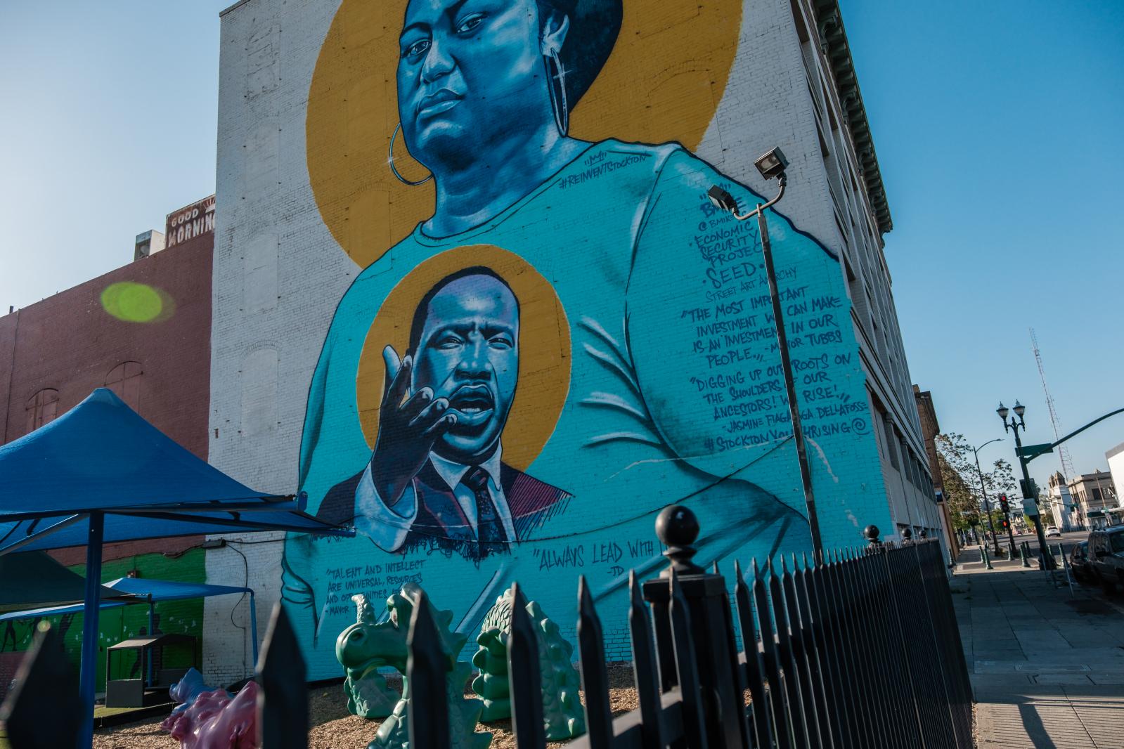 Image from Universal Basic Income: Trying to save a city - STOCKTON, CA - APRIL 5: A mural by Brandan Odums shows...