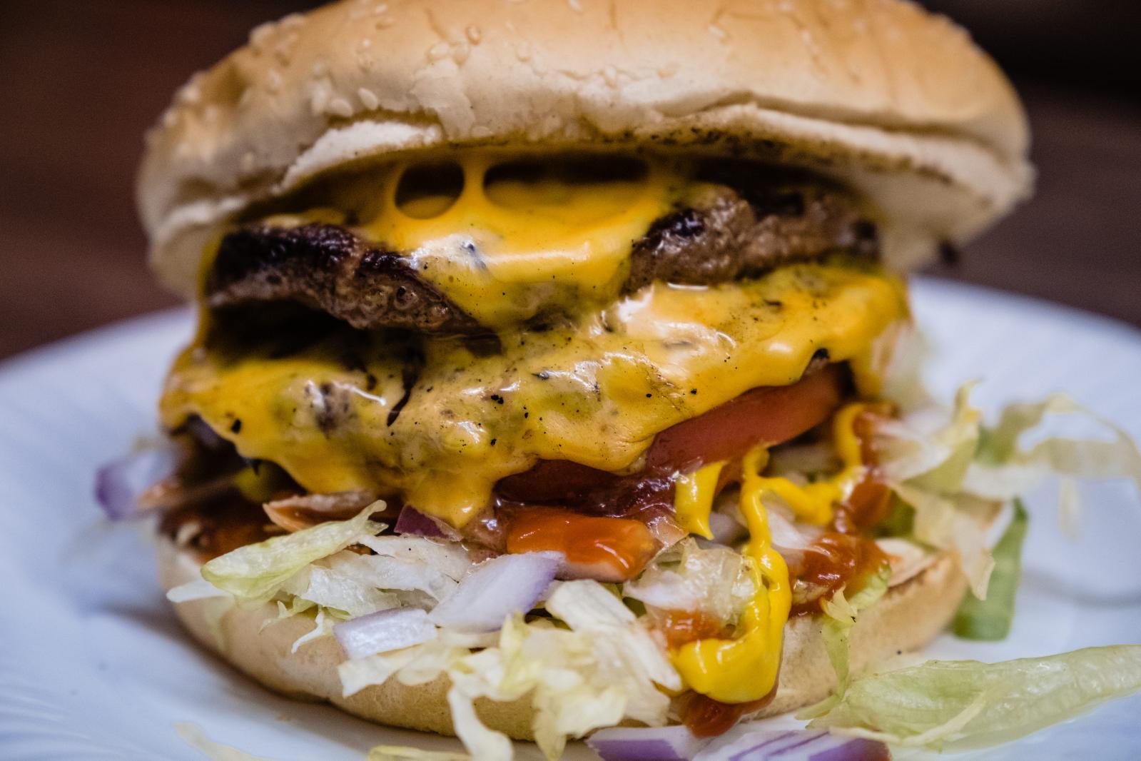 Image from FOOD/DRINK - A double cheeseburger is seen at Sam’s Burgers in...
