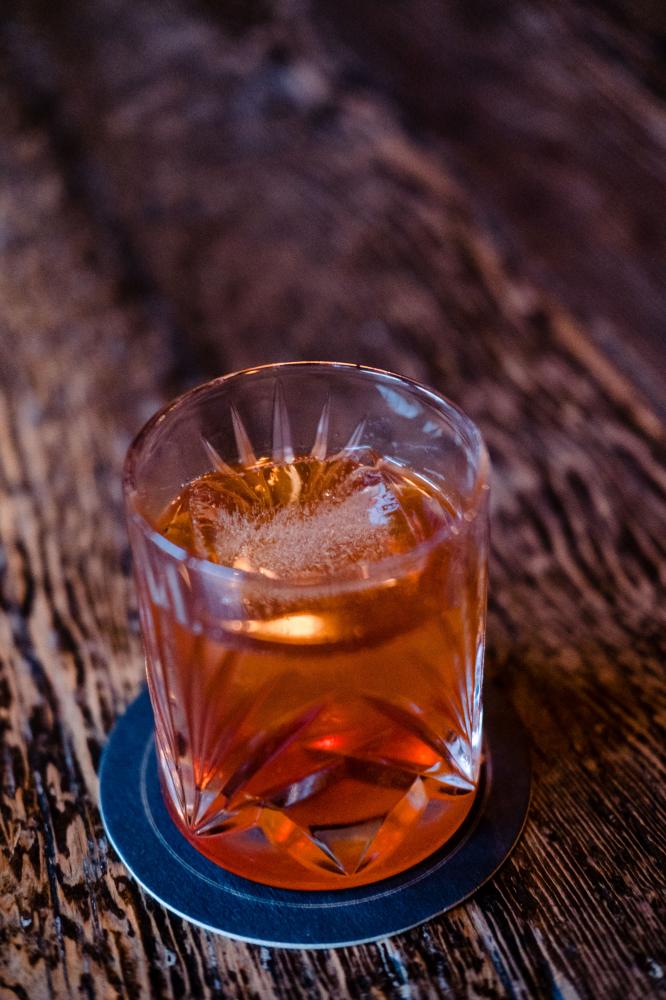 Image from FOOD/DRINK - A photo of the Brown butter old fashioned cocktail at...