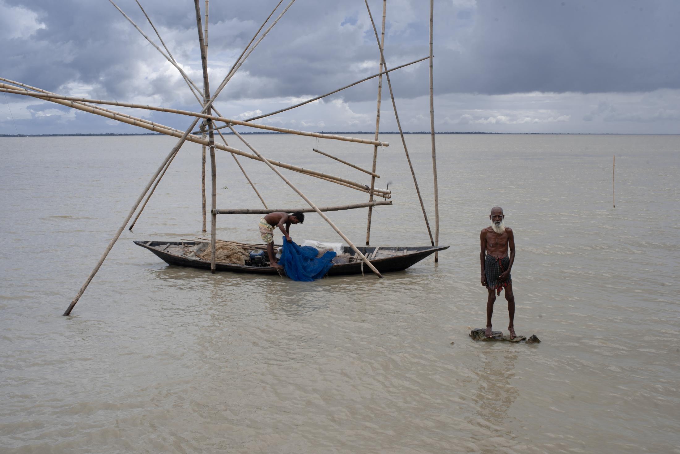 The Depth of Flood - Flood-affected people placed fishing equipment in their...