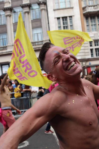 Joy - In Photos  - A reveler at the London Pride Parade. Completed, uninhibited joy. Image copyright Sarah Sabatke.