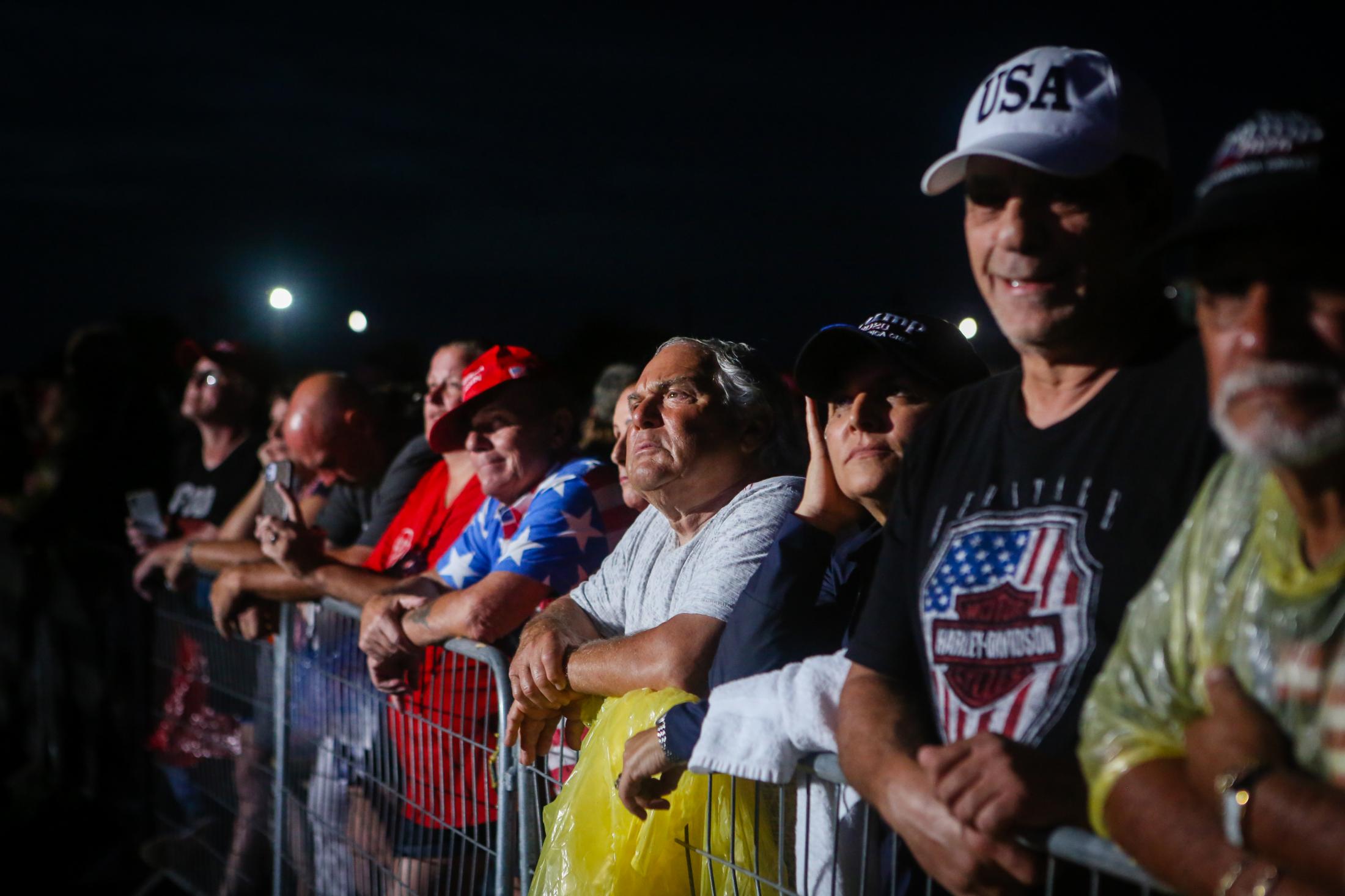 2021 - Former U.S. President Donald Trump @ Sarasota, FL - SARASOTA, FL - JULY 03: People listen as former U.S....