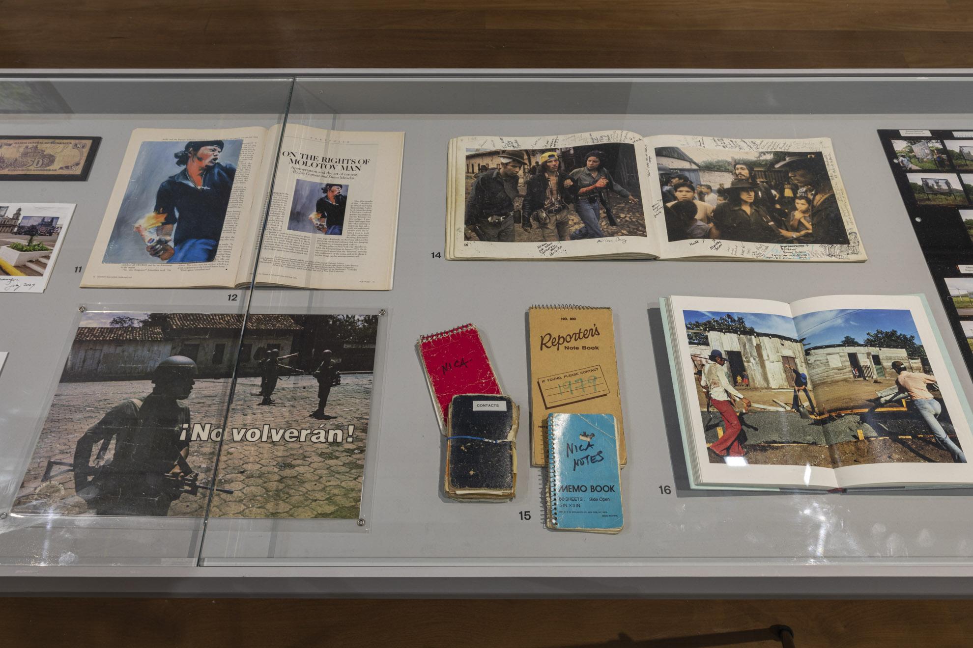 Notebooks and tearsheets from Nicaragua in a vitrine at Instituto Moreira Salles, Sao Paulo,...