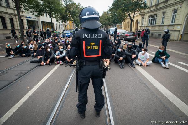 Day of German Unity Protest-Getty Images - HALLE, GERMANY - OCTOBER 3: Protesters block a street in...