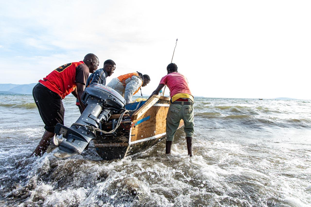 Anthony Ochieng Onyangoi I Powering the 'Ghost Town' of Rusinga Island - A fishing squad sets off to the lake, the boat powered by...