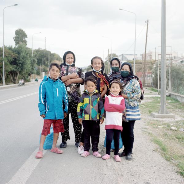 Image from In the Name of God -   Mahboobeh and her family outside the camp. “When...