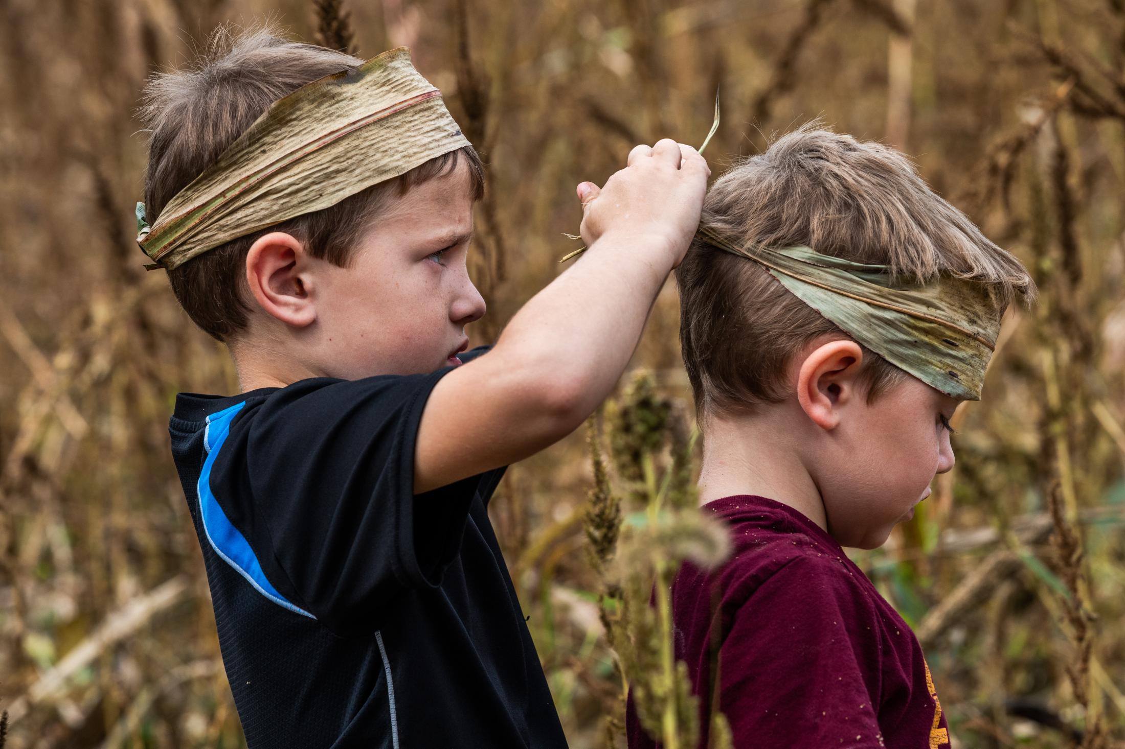 A Sweet Family Tradition - Rydden and Kyson Hayes make headbands out of sorghum cane...