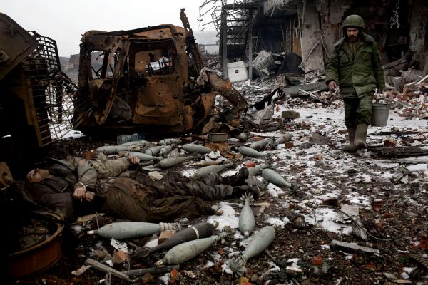 Image from Ukraine Crisis-The East - The bodies of UA army soldiers laying outside the old...