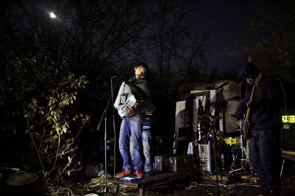 Image from Ukraine Crisis-The East - Members of the band from Kharkiv, performing in-front of...