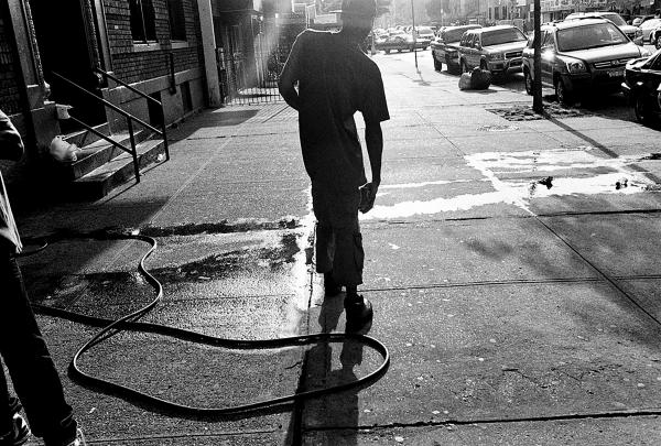 Participant of the S.O.S youth program, near his apartment building in the neighbourhood of Crown Heights.