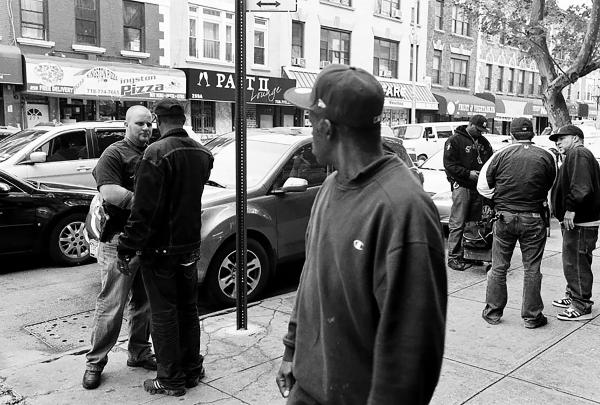 Image from United We Thrive-Divided We Die - Police detectives of the 77th precinct, during a...