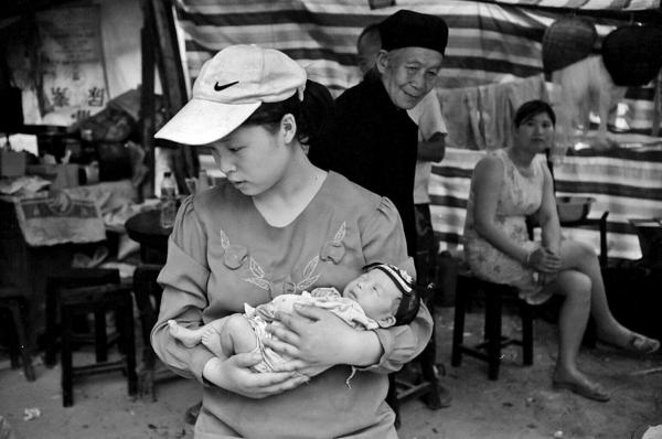 China Quake Aftermath - A baby who was born one week after the 7.8 magnitude...
