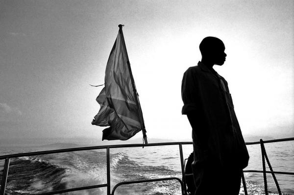 A young boy on a boat sailing from Goma (north Kivu) to Bukavu (South Kivu), lake Kivu.
