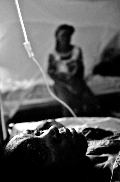 Image from DRcongo Conflict - A local villager who was injured during clashes between...