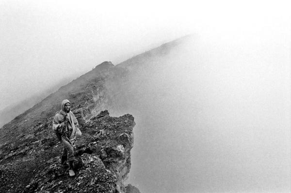 DRcongo Conflict - A local national park ranger, standing on peak of Mt...