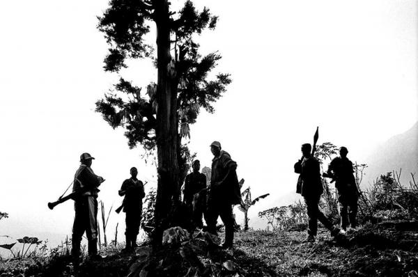 Young FDLR Hutu militia soldiers, &nbsp;getting ready to go out on patrol near their camp, Kilungutwe , South Kivu.