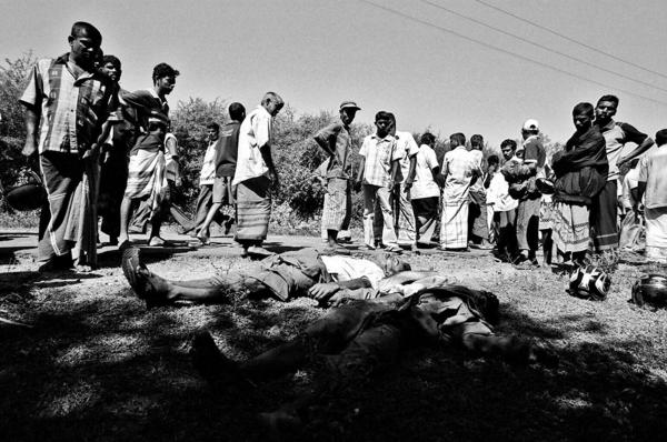 Two bodies of Sinhalese civilians (out of 10) who were killed allegedly by LTTE carders at the village of Galkotukanda, South Sri Lanka.