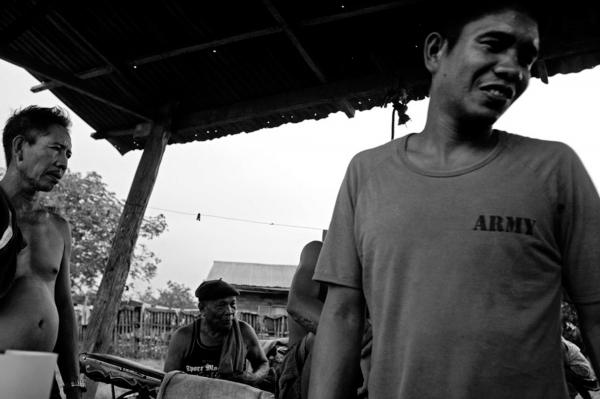 Image from The Ilaga - Relaxing after a day's work in the fields, Bagolibas...