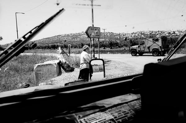 Reservists guarding a settlers march between two settlements, near Jenin.