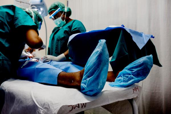 Image from Tried&Tested - The circumcision procedure is being performed b they...