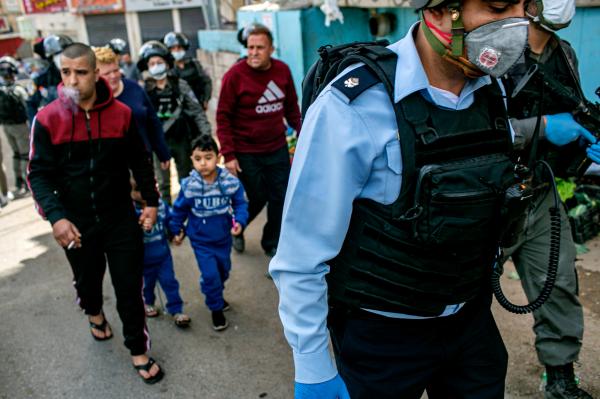 Israeli police officers during a patrol in the Palestinian refugee camp of Shuafat. East Jerusalem.