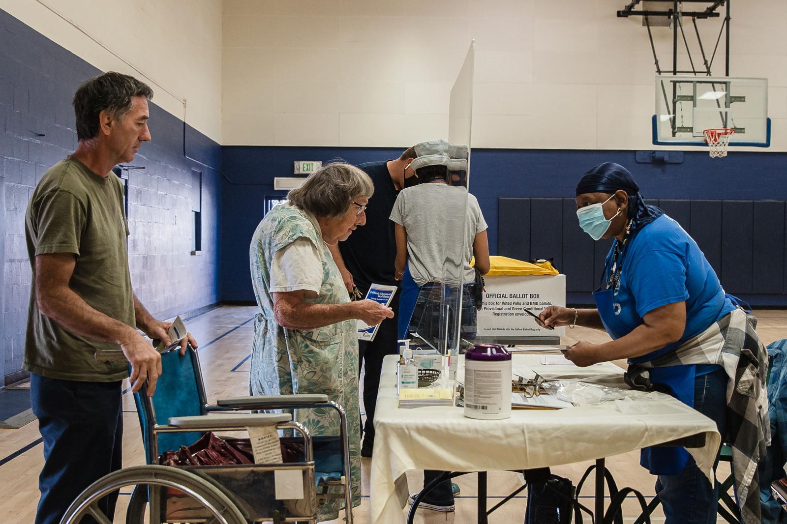 Voters at a polling station for the California gubernatorial recall election at the Golden Hill Recreation Center in San Diego, California on September 14, 2021.