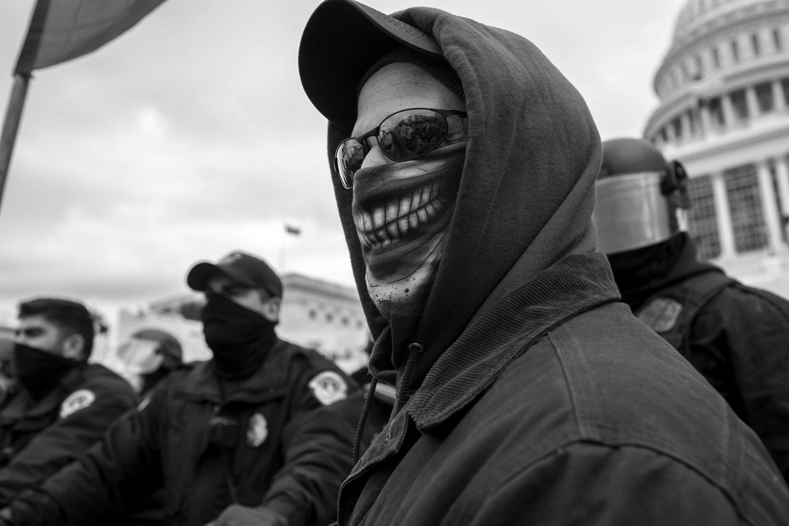 A man wearing a Joker face mask.... 6, 2021. Photo by Robb HIll. 