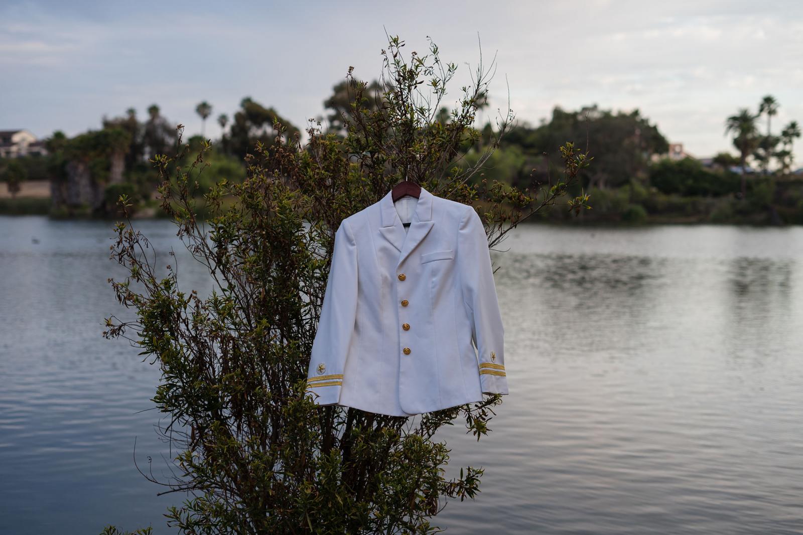 Lyla Kohistany&#39;s US Navy uniform jacket was worn during the summer season hangs on a tree at Lake Murray in San Diego, California on July 2, 2021. &nbsp;Kohistany left Afghanistan when she was a toddler and didn&#39;t really see Afghanistan until she was 25 years old, U.S. Navy intelligence officer. Her family fled to America in 1982, after her father spoke out against the Soviet occupation.