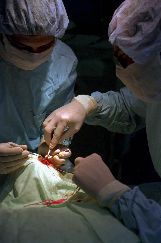 Surgeons working with the Human...ent operation in Iași, Romania.