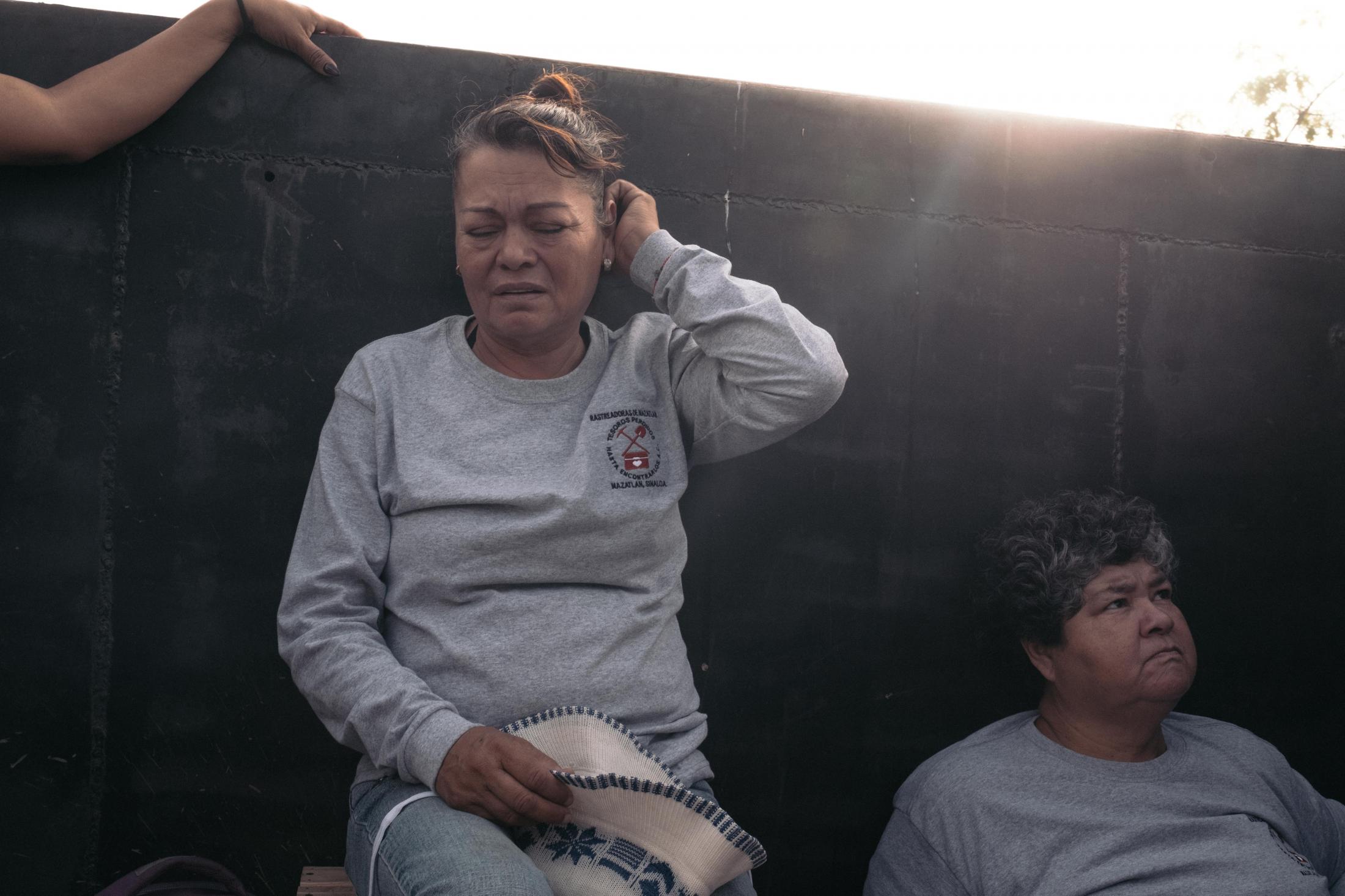  Each week a group of ten mothers like Isidra Lopez (C) go in search of clandestine burial pits. Not receiving any help from neither national nor...