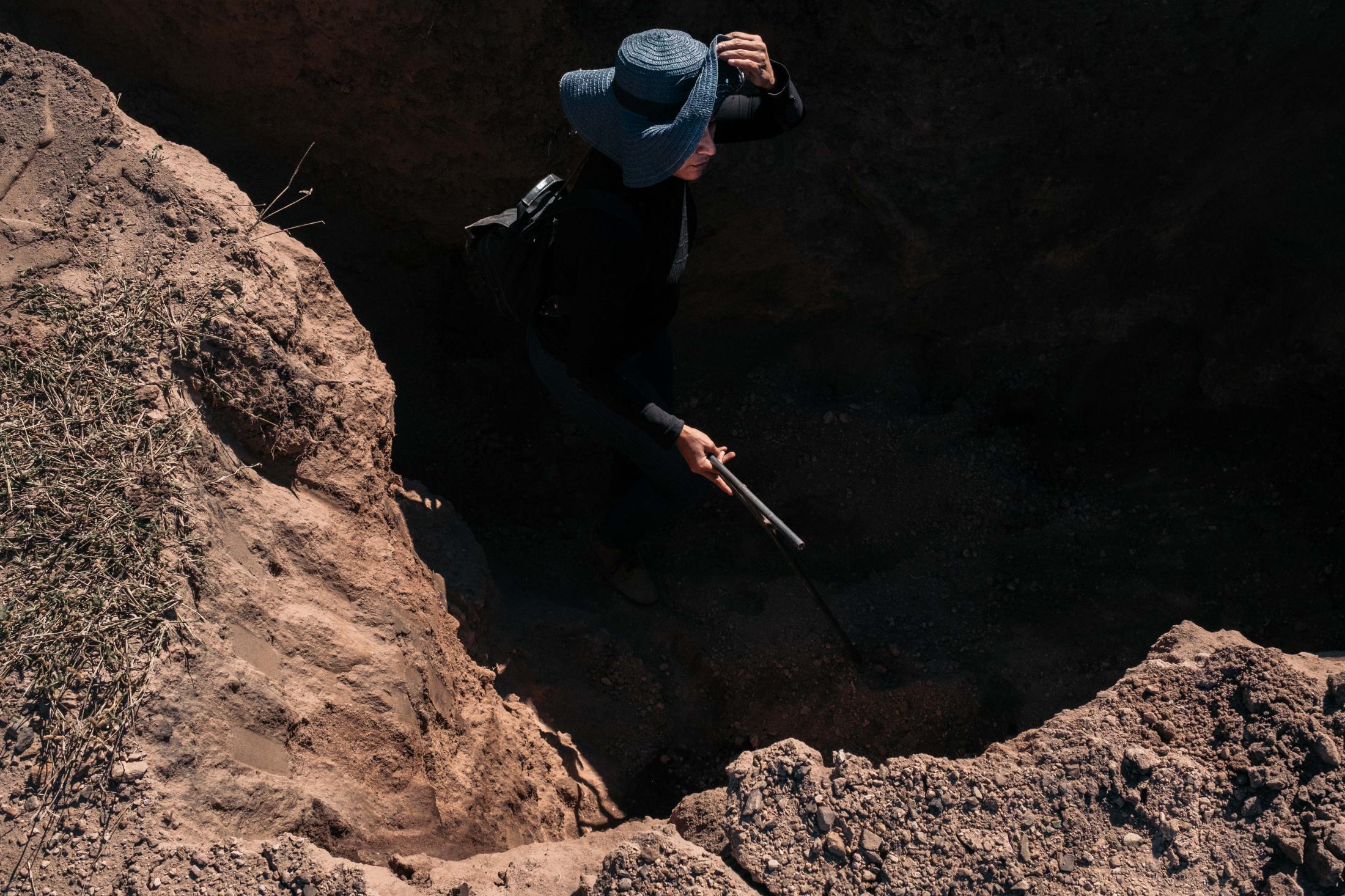  Cecilia searches for the body of her missing son by digging a hole in the ground with a backhoe rented for the day. Poking the earth allows one to...