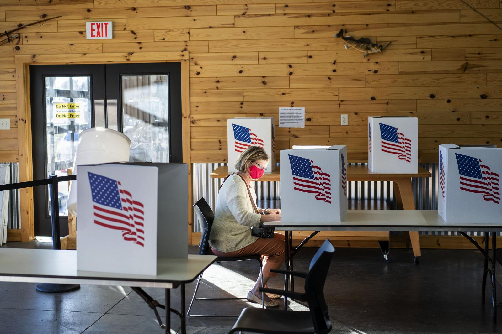 Politics - Cindy Spellberg of Granger, Iowa casts her vote on...
