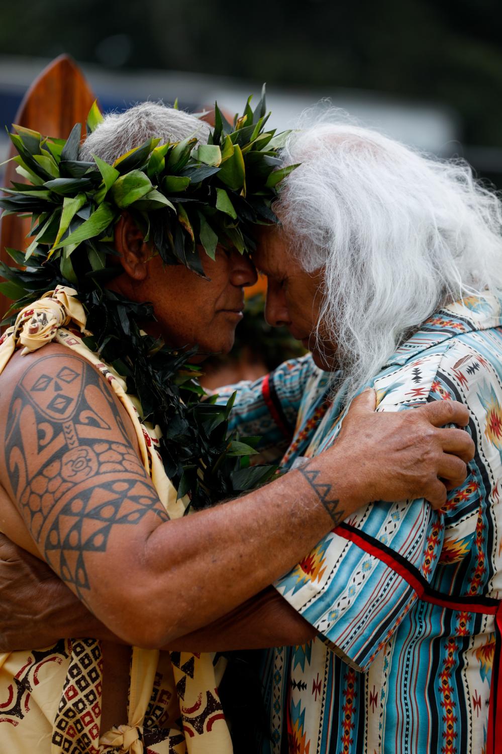 Red Road To Dc - Indigenous elders share an embrace during the welcoming...