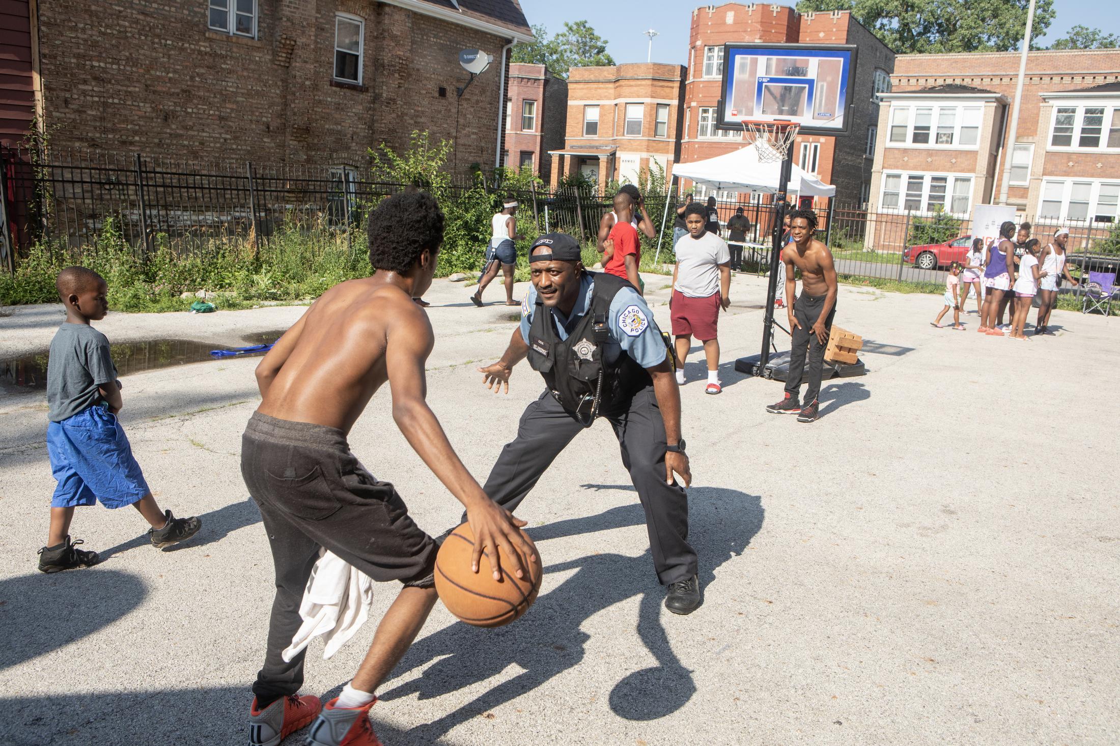 10 years in a boxing gym - CPD Officer Cook playing basketball with the Crushers...
