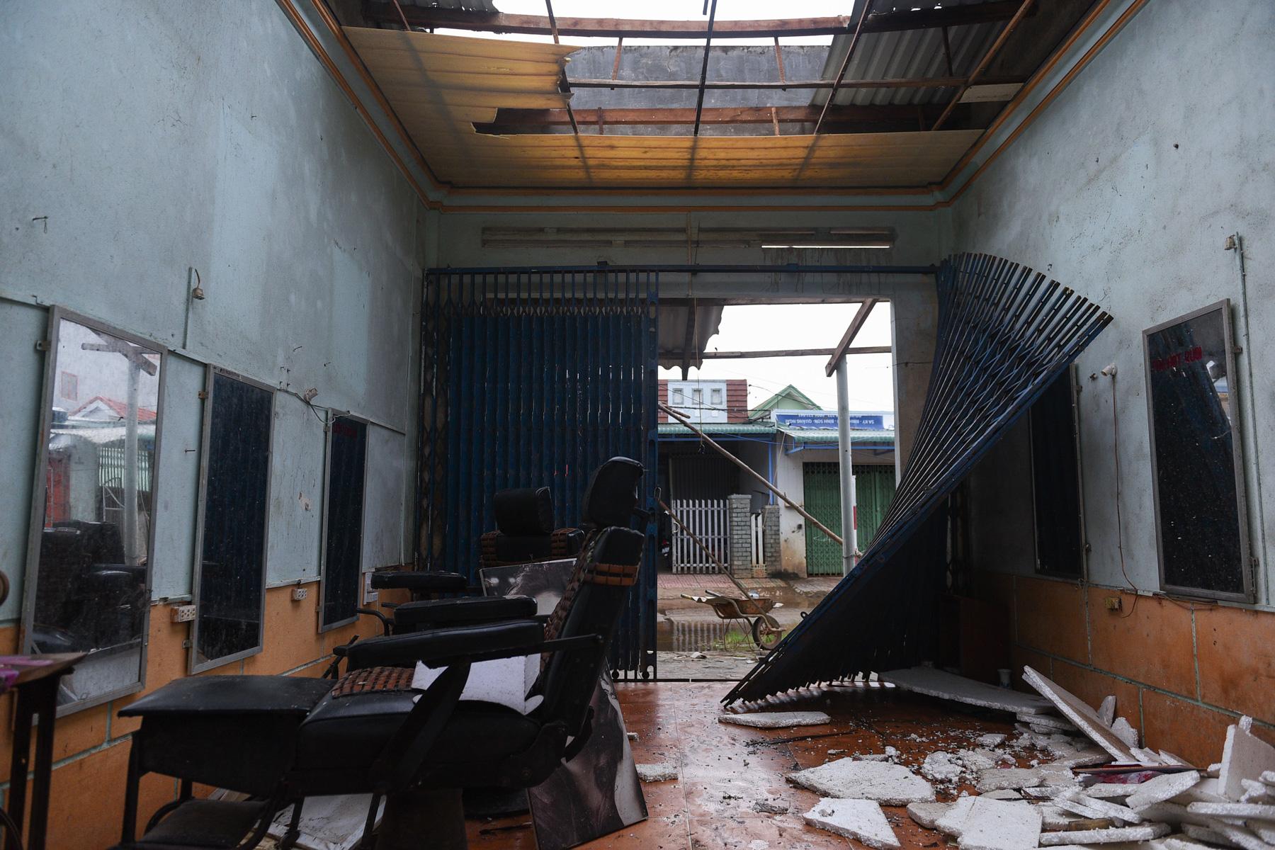 A month with full of sorrow - A barbershop is seen damaged by the Typhoon Molave in...