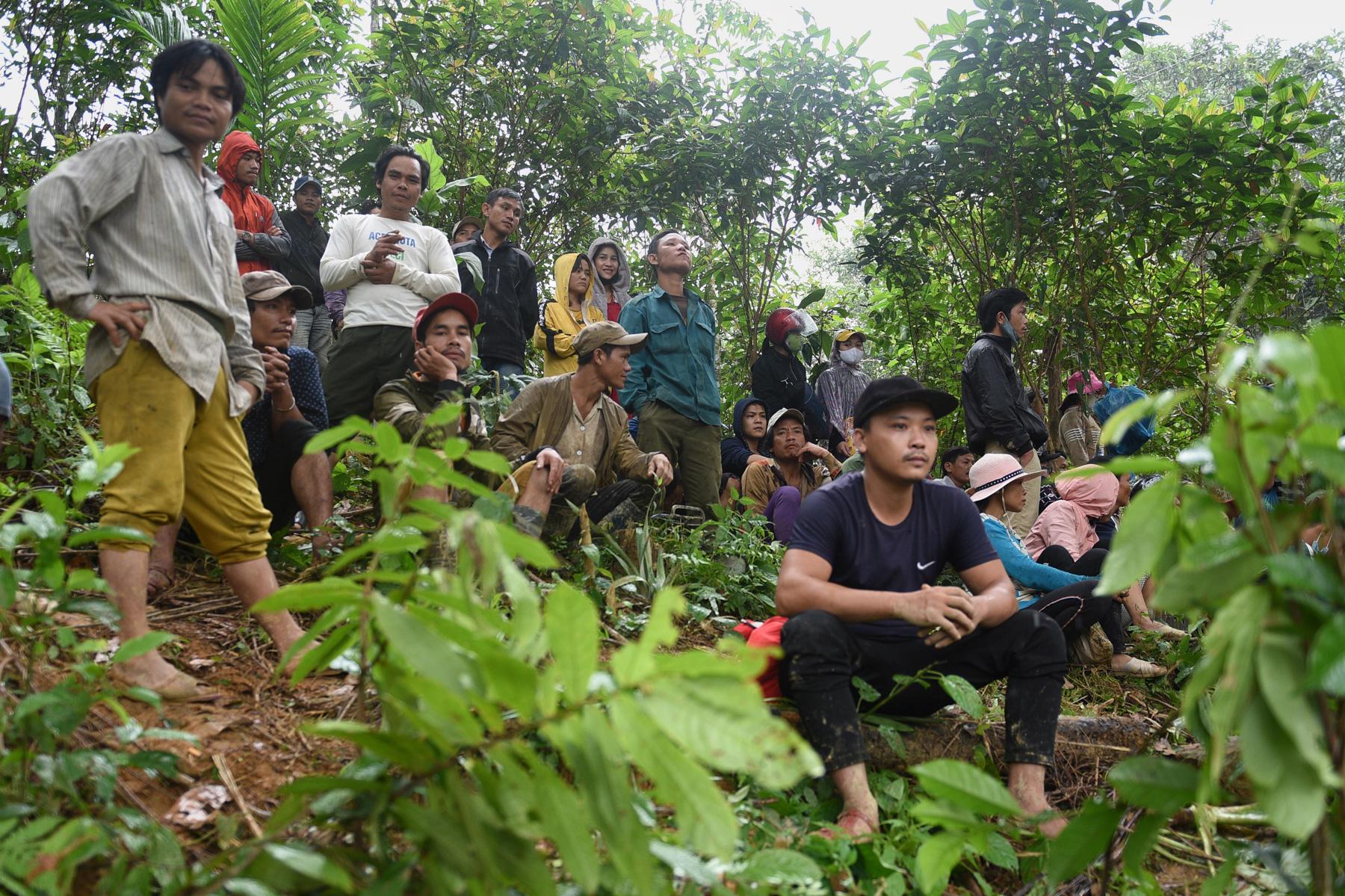 A month with full of sorrow - Residents wait for a rescue team to find missing people...